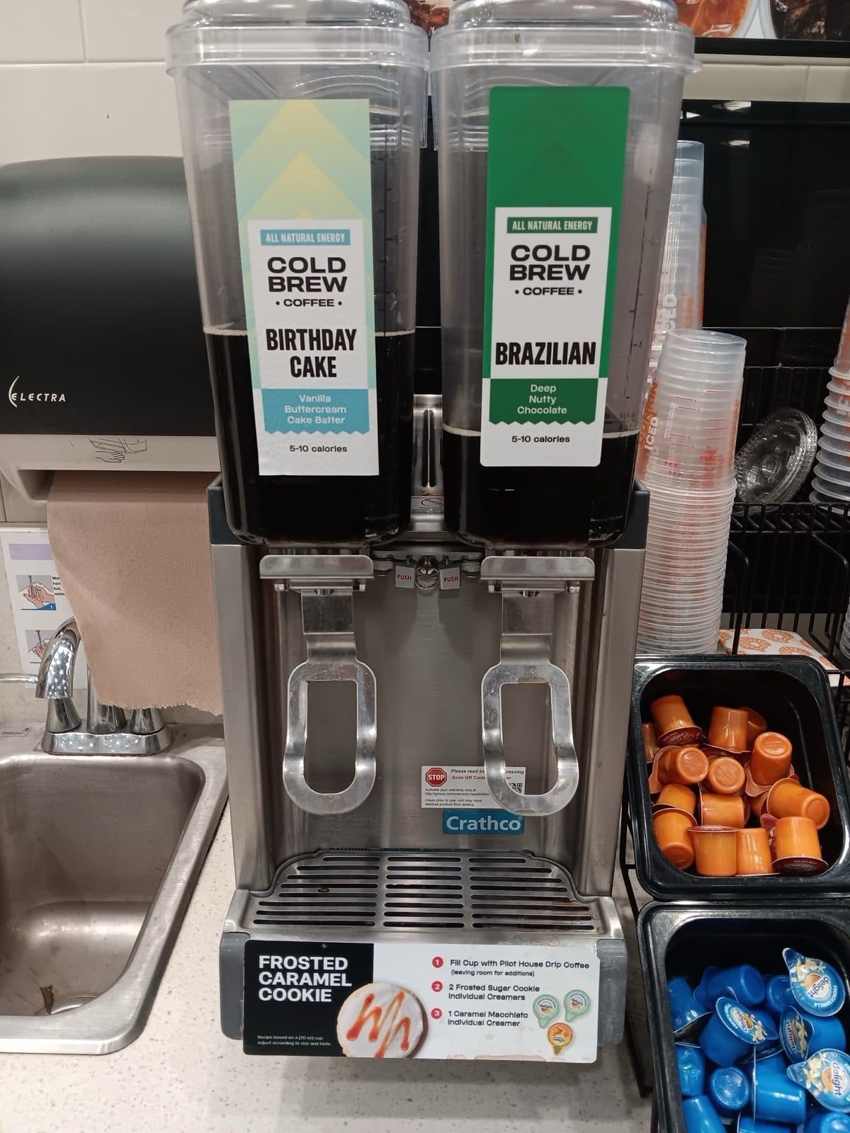 Twin-bowl refrigerated bubbler dispenser serving two cold brew coffees