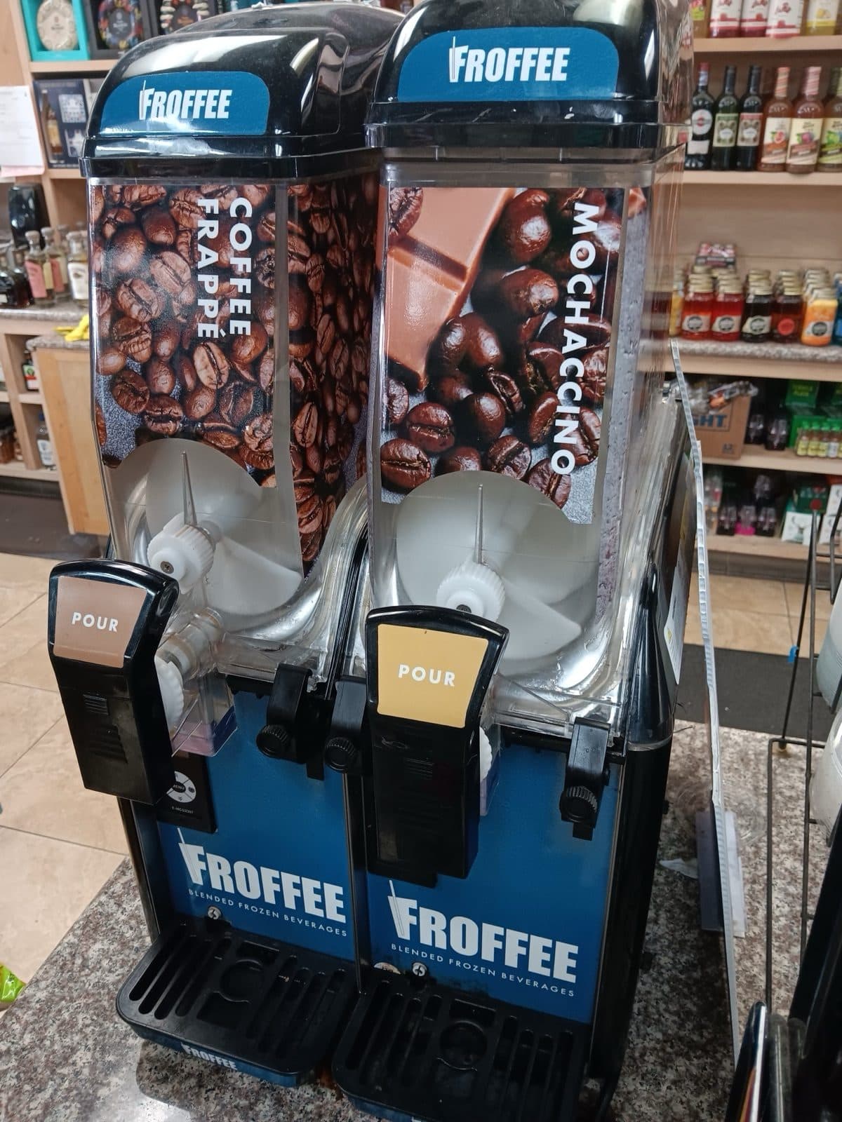 Froffee-branded twin-bowl granita machine on a store counter